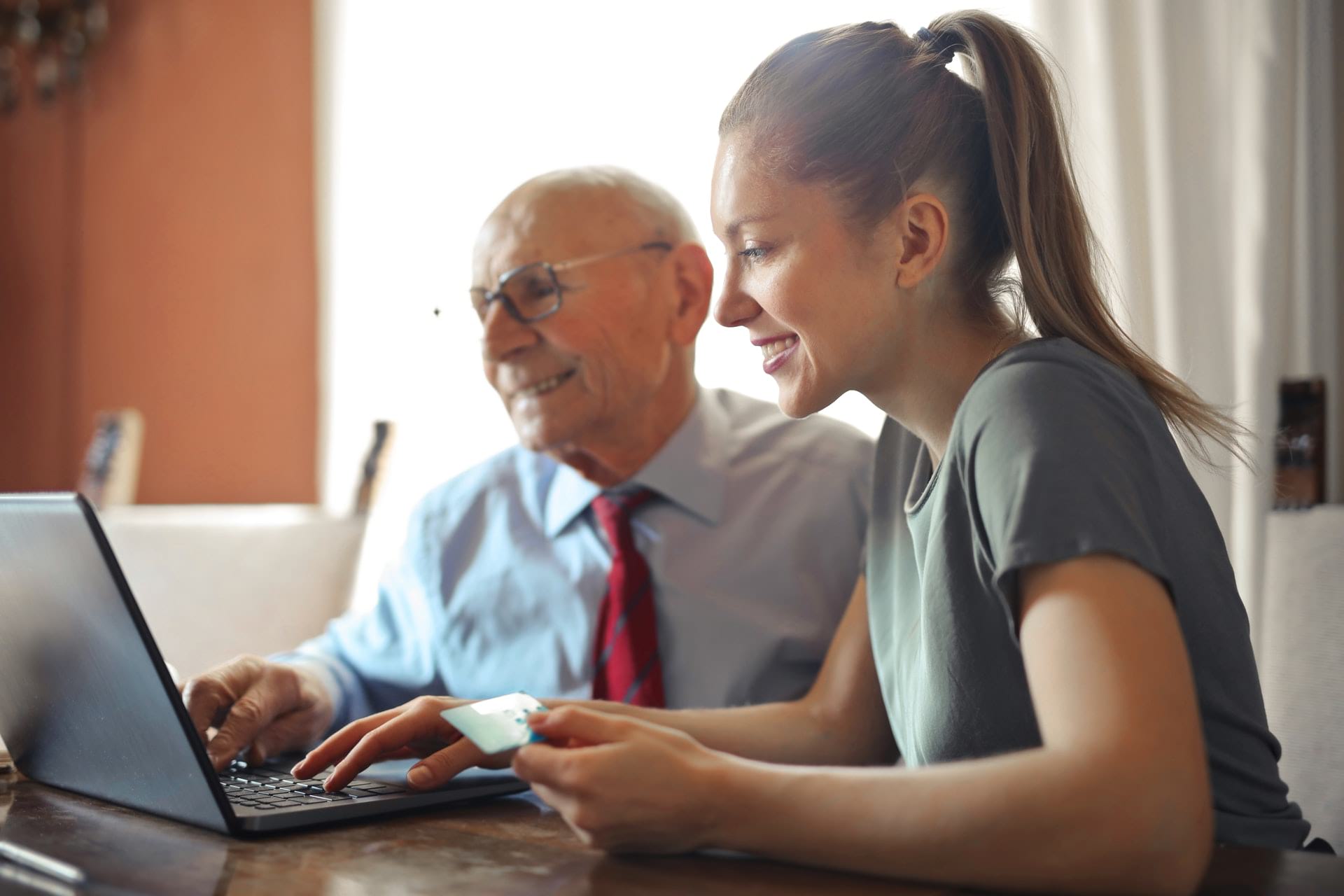 Man and woman in front of computer